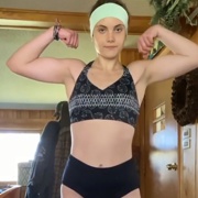 17 years old Powerlifter Maddie Flexing muscles