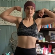 17 years old Powerlifter Maddie Flexing muscles