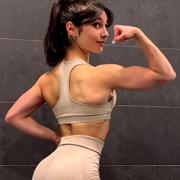 19 years old Fitness girl Sara Flexing muscles