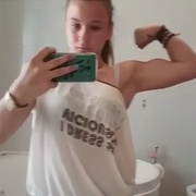 14 years old Gymnast Giovanna Flexing biceps