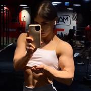 16 years old Fitness girl Nicky Flexing muscles