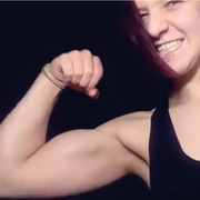 17 years old Bodybuilder Gabriela Flexing biceps