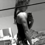 16 years old Fitness girl Elli Flexing muscles