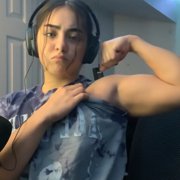 18 years old Powerlifter Emily Flexing biceps
