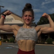 19 years old Fitness girl Kat Flexing biceps