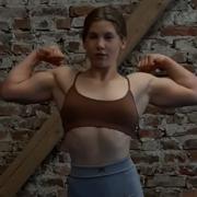 14 years old Fitness girl Sulamith Flexing muscles