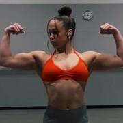 18 years old Powerlifter Joy Flexing muscles
