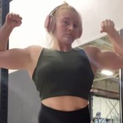 18 years old Powerlifter Abigail Flexing muscles