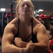 16 years old Powerlifter Rhian Flexing muscles