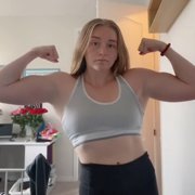 16 years old Powerlifter Abigail Flexing biceps
