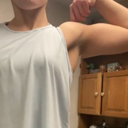16 years old Powerlifter Maddie Flexing muscles