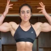 18 years old Fitness girl Rosario Flexing biceps