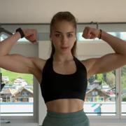 14 years old Fitness girl Olivia Flexing biceps