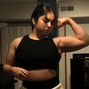 17 years old Powerlifter Emily Flexing muscles