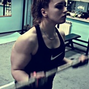 18 years old Powerlifter Julia Flexing muscles and workout