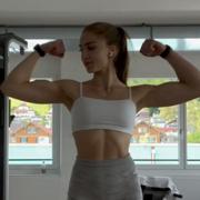 14 years old Fitness girl Olivia Flexing muscles