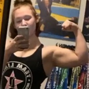 19 years old BJJ girl Ansleigh Flexing biceps