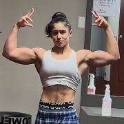 17 years old Wrestler Isabella Flexing muscles
