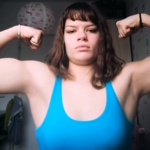 13 years old Fitness girl Lara Flexing muscles