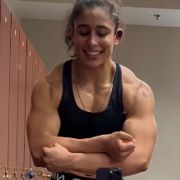16 years old Wrestler Isabella Flexing muscles
