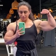 19 years old Fitness girl Rosario Flexing biceps