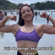 13 years old Fitness girl Laura Flexing muscles